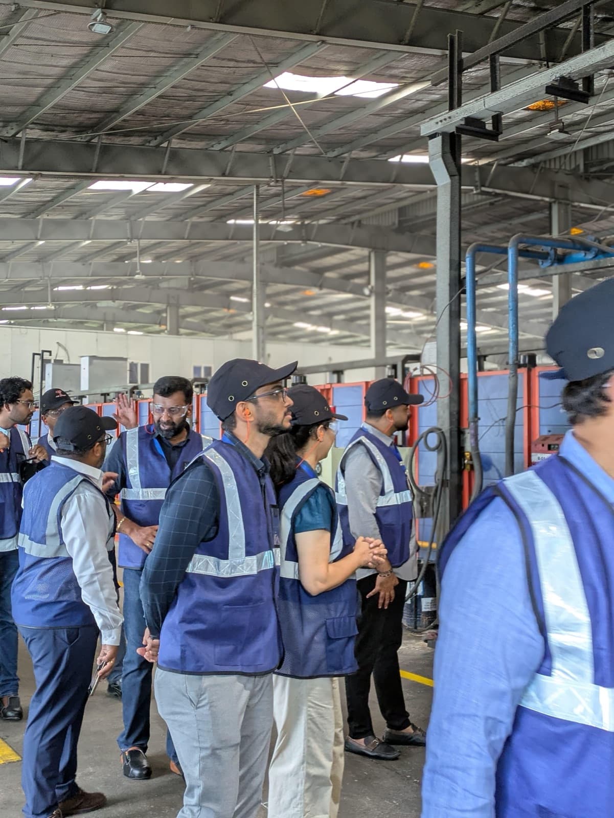 Venture capital firms walking a live manufacturing floor