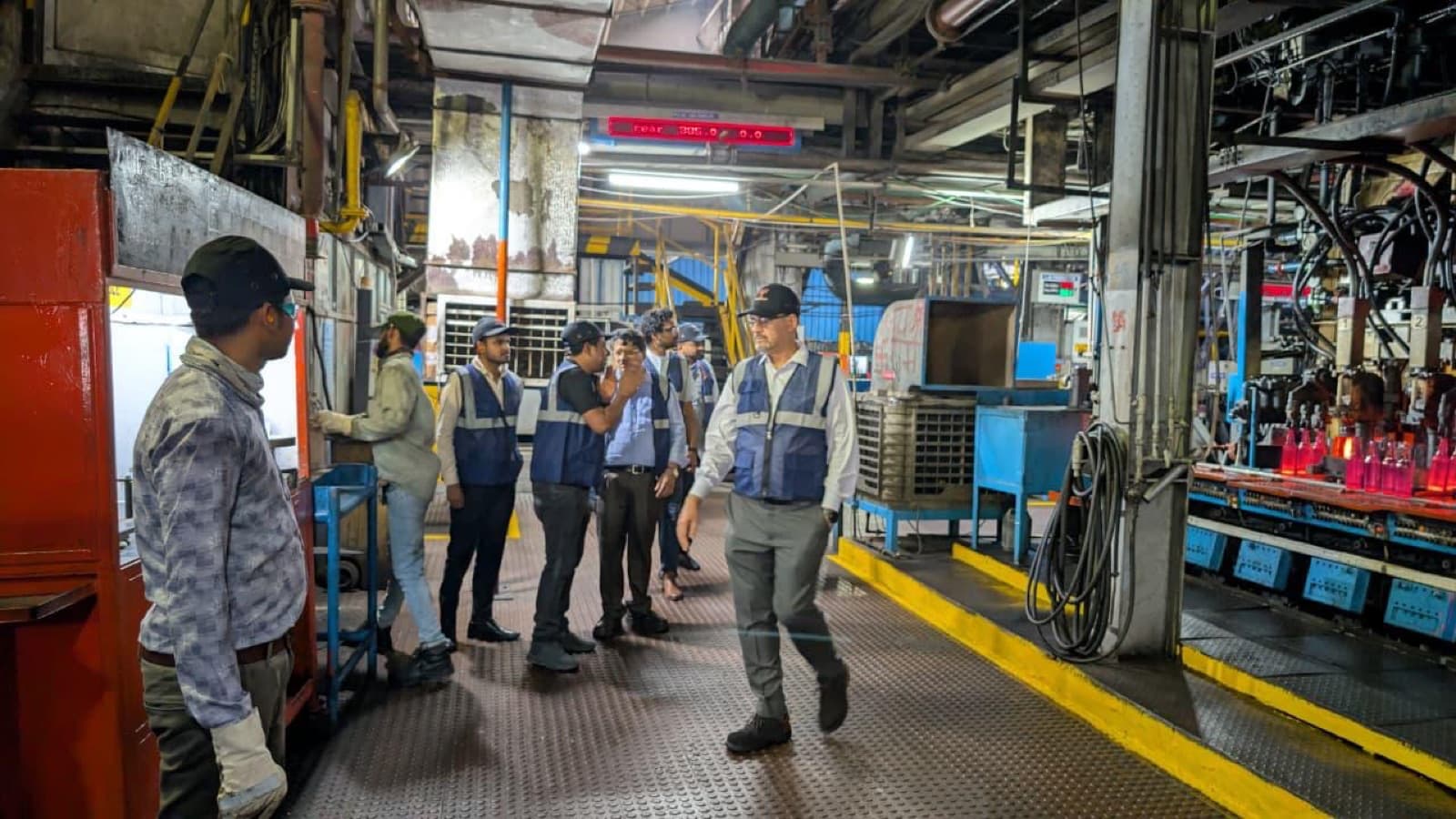 Venture capital firms walking a live manufacturing floor