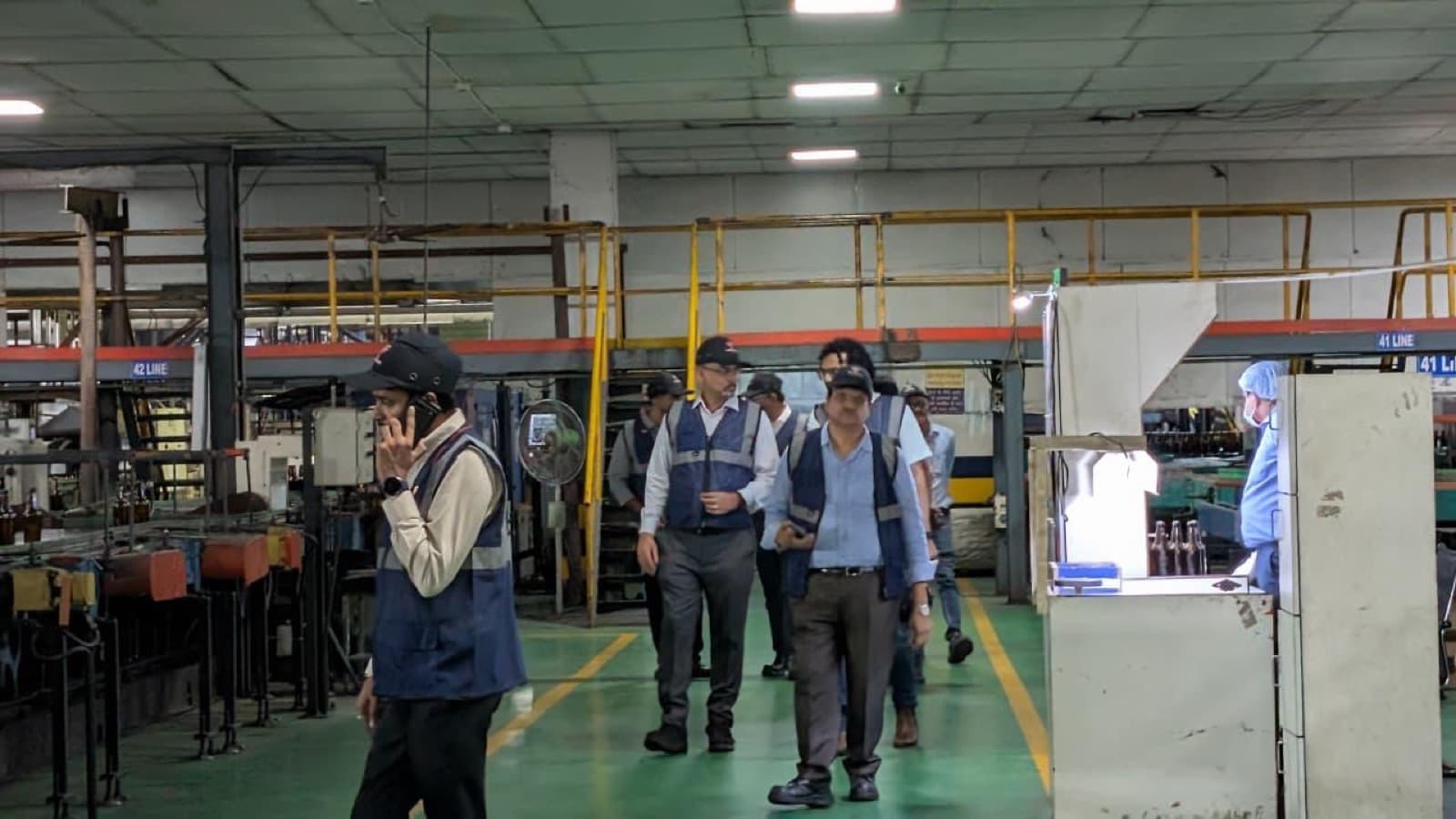 Venture capital firms walking a live manufacturing floor