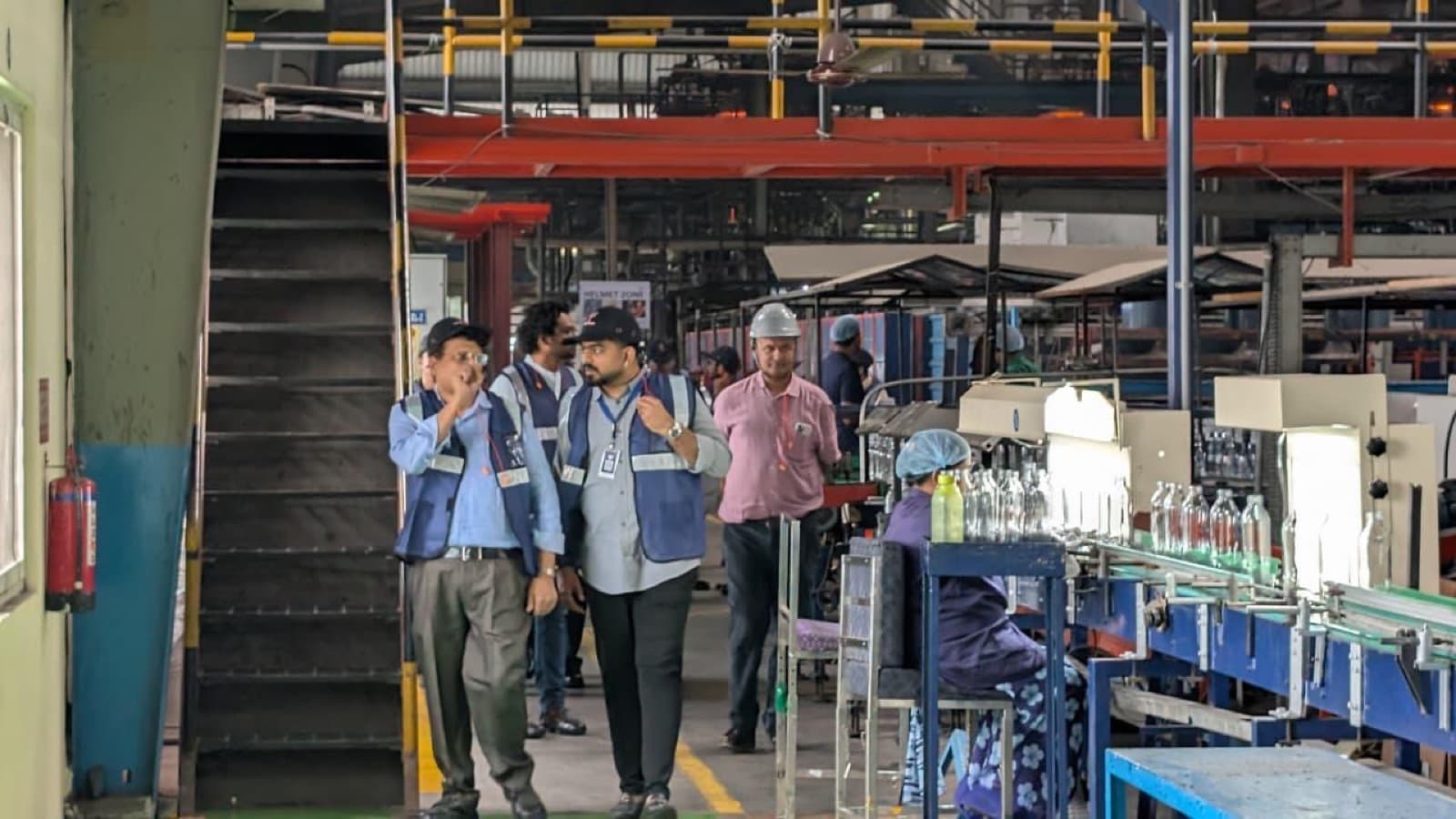Venture capital firms walking a live manufacturing floor